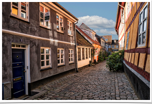 Side streets are colorful and flower filled.